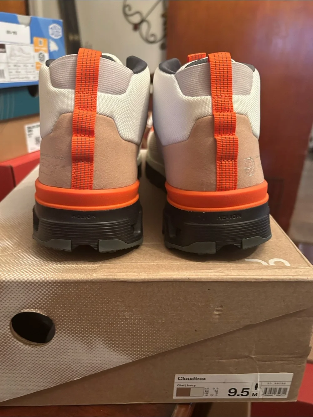 Men’s On Cloudtrax Shoes in Chalk/Ivory with Orange Accents